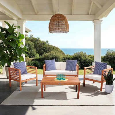 Arlethe Wood 4 - Person Patio Conversation Set with Cushions