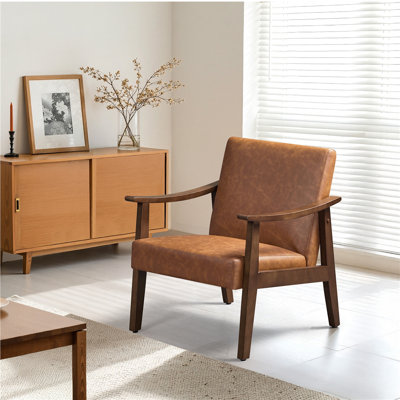 Asmat 24.5" W Mid-Century Modern Faux Leather Armchair with Solid Wood Legs by Wade Logan