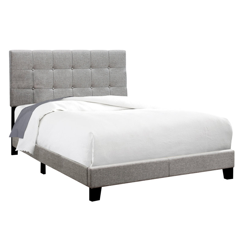 Lit double tapissier en lin gris pour une chambre à coucher contemporaine avec tête de lit et structure solide