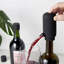 Verseurs et bouchons électriques de vin