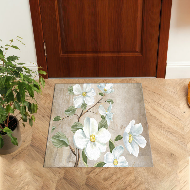 Superbe tapis non tissé à imprimé mince avec un motif floral subtil dans des tons de terre, parfait pour ajouter une touche d'élégance à n'importe quelle pièce de votre maison
