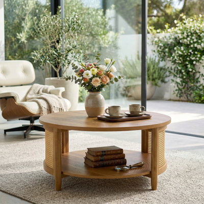 A Simple, Light Honey-Colored Rattan Coffee Table Paired With An Open Bookshelf Design Is Both Practical And Aesthetically Pleasing, Effortlessly Enhancing The Style And Ambiance Of Your Living Room.