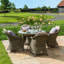 Danterius 4 - Person Patio Dining Set Round Table with Cushions Included