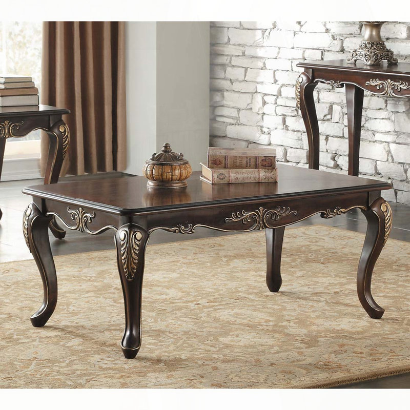Table basse traditionnelle avec basculement doré