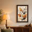 Tableau mural en toile beige texturée représentant des feuilles stylisées orange et grises-2123414100
