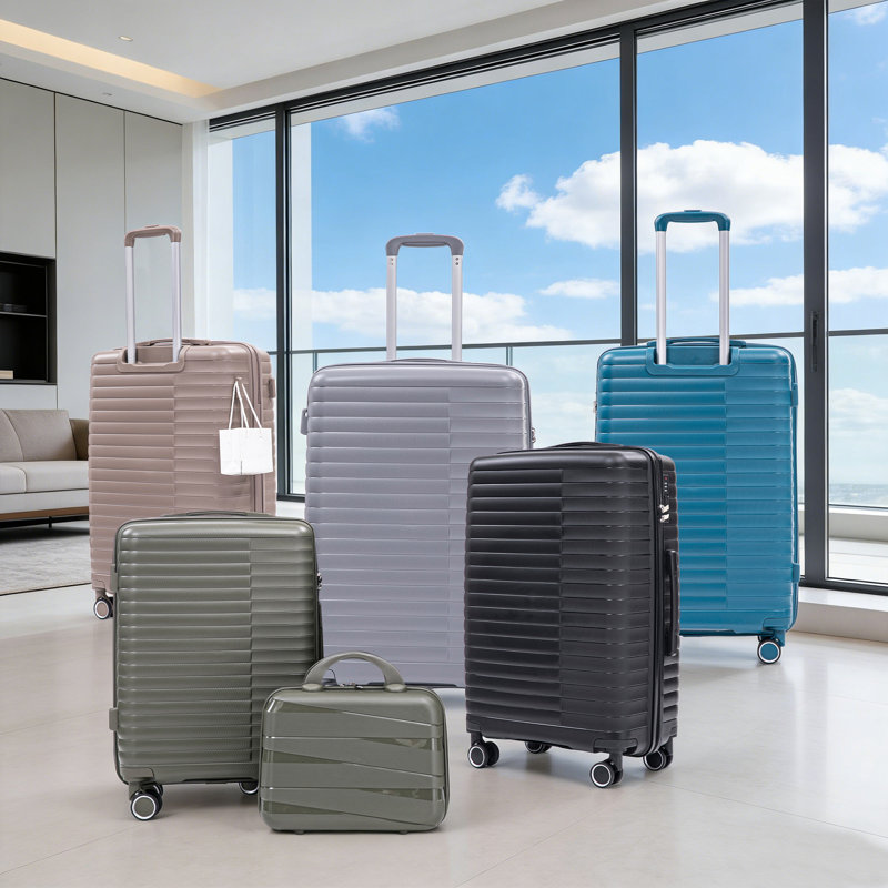 14 "/ 20" / 24 "/ 28" 4 pièces / ensemble dans une valise à roulettes en PP
