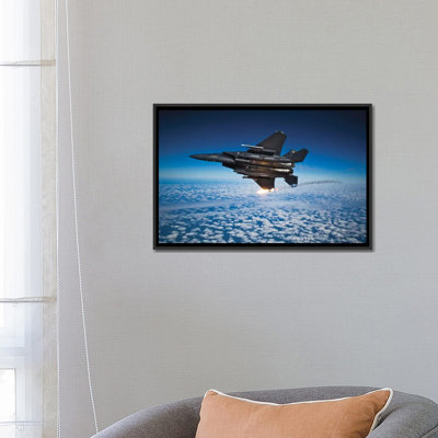 " F-15E Strike Eagle Aircraft Releases Flares I " by Stocktrek Images