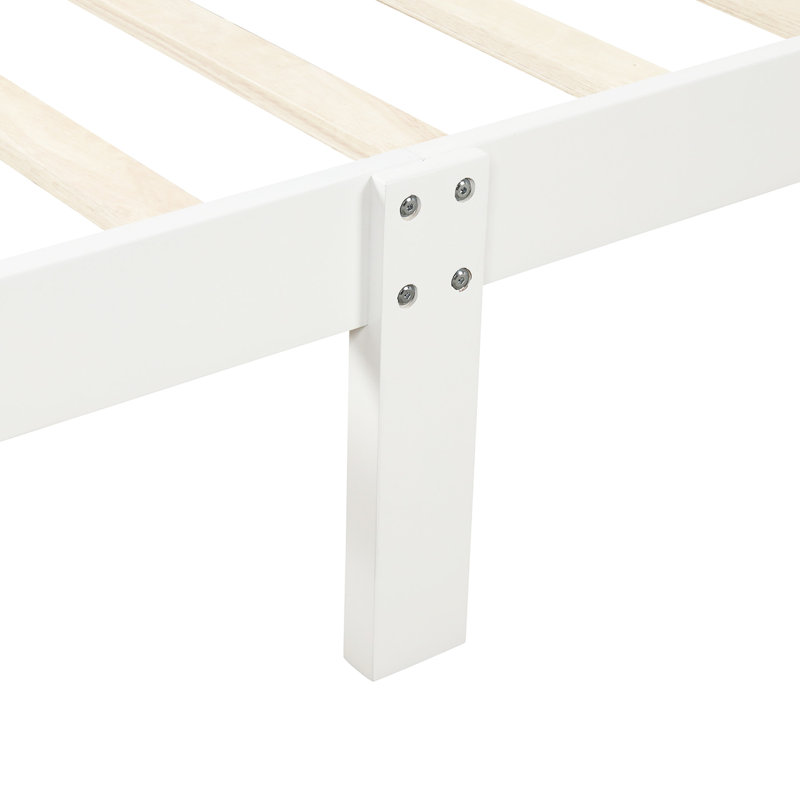 Lit plateforme simple en bois massif avec tête blanche