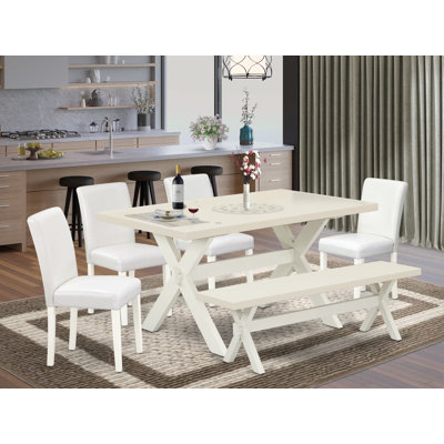 Ensemble de salle à manger 6 pièces avec table en bois et petit banc - 4 chaises Parson en similicuir (finition blanche)