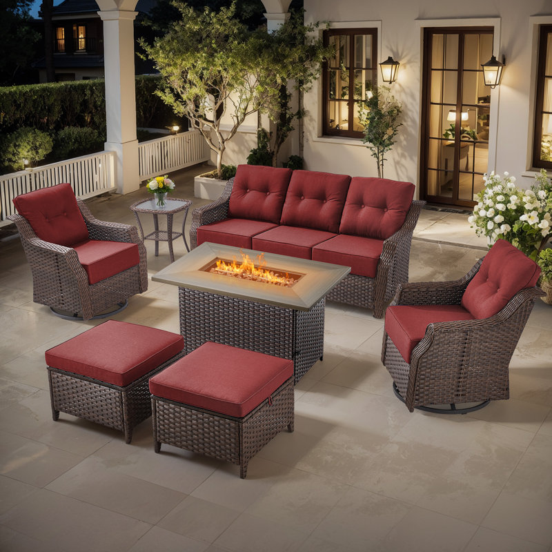Sami 7-Piece Wicker Patio Furniture Set With Fire Pit Table, 6-Inch Thick Cushioned 360° Swivel Glider Chairs & Ottomans, Red
