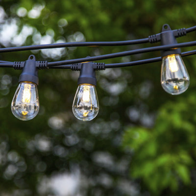 Ambience Pro 27 ft. Outdoor Solar-Powered LED String Lights with 12 Warm White S14 Bulbs, Weatherproof, Commercial-Grade Cord and 15-Piece Hook Set