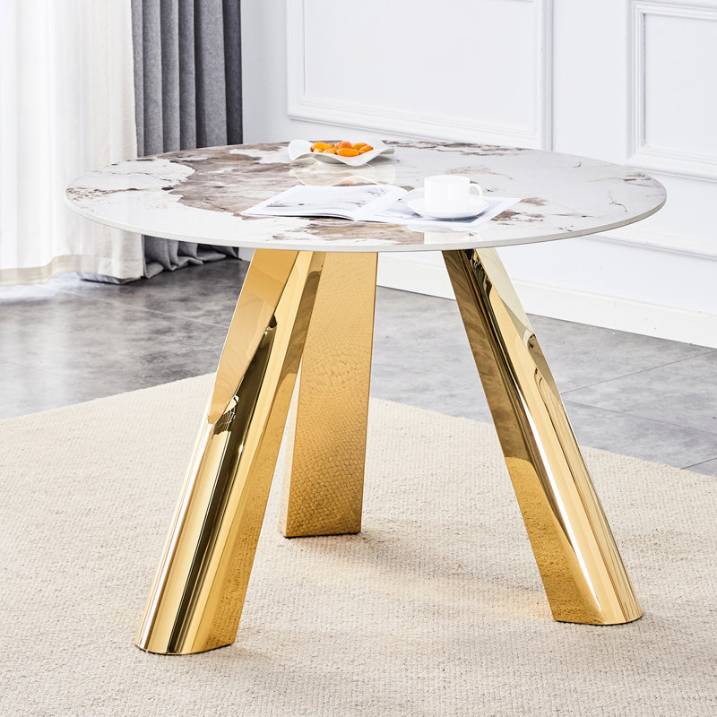 Table ronde de 42 po avec plateau en pierre frittée blanche et pieds en acier inoxydable doré offrant de superbes pieds vitrifiés pour les salles à manger