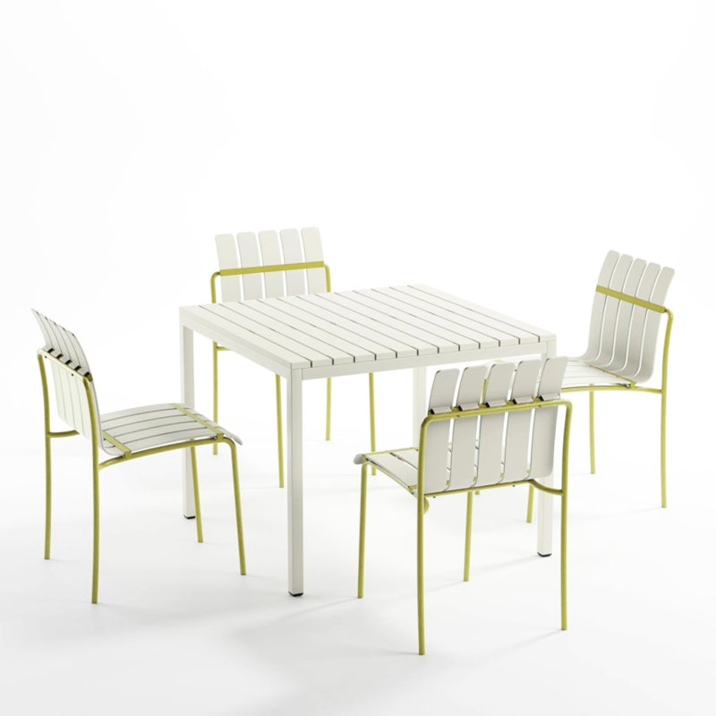 Lot de 4 chaises modernes à rayures avec pieds en polypropylène imperméable et métal pour repas à l'intérieur/extérieur, assise bicolore blanc crème et jaune grainé pour balcon.