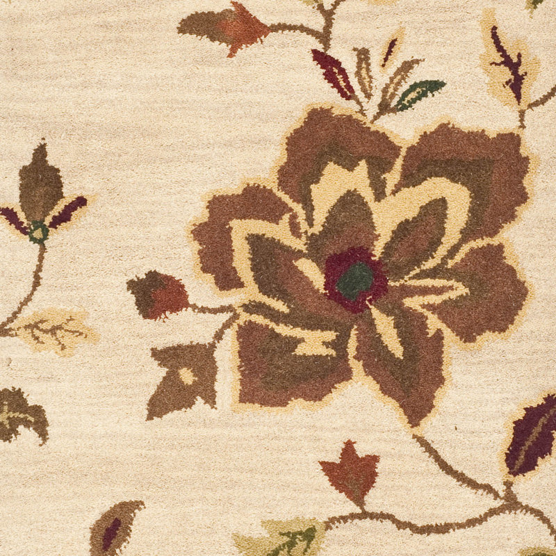 Ivory and Multicolor Floral Tufted Wool 4' x 6' Area Rug
