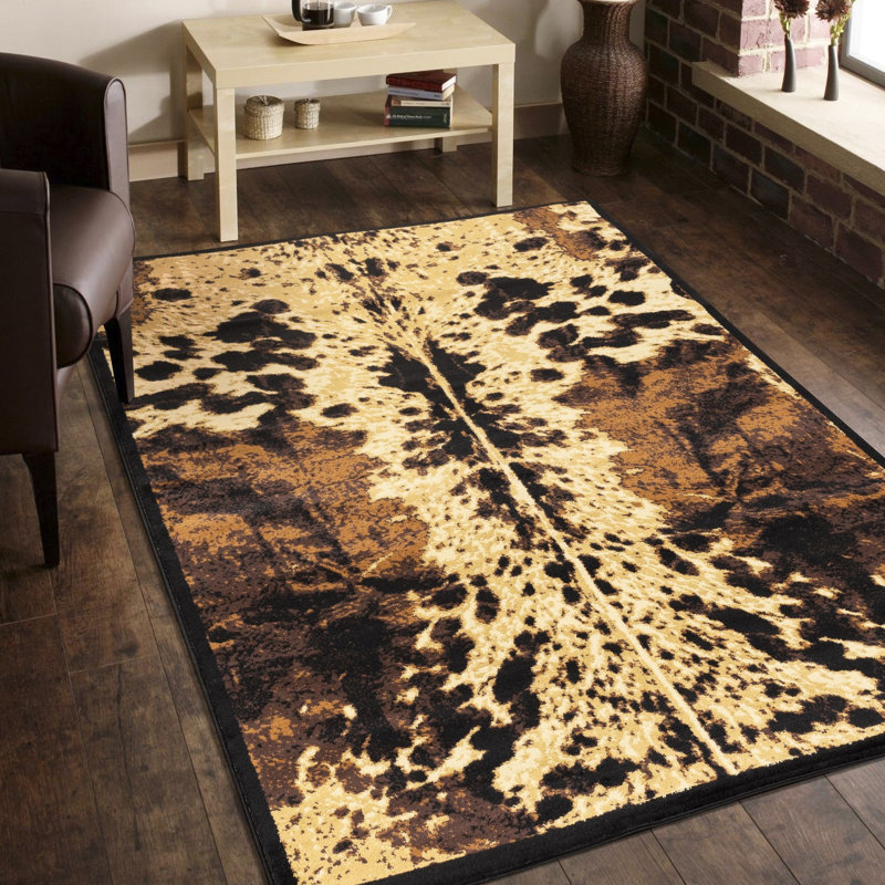 2 pi 7 po X 3 tapis en polypropylène noir à motif de peau de vache teinté pour les espaces très passants et les poils de 0,38 po