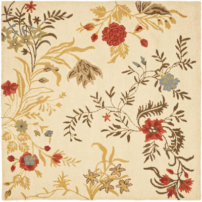 Emrick Hand Hooked Wool/Cotton/Latex Floral Rug in Beige