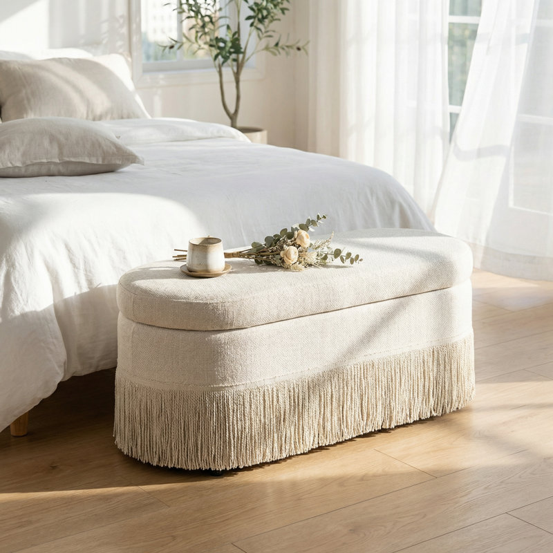 Oval Upholstered Storage Ottoman with Fringe Trim and Lift-Top Lid for Multi-Functional Use in Living Room or Bedroom, Beige