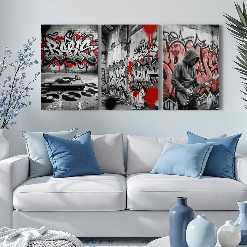 Ensemble de 3 tableaux muraux sur toile représentant des disques vinyles de musique graffiti et un guitariste