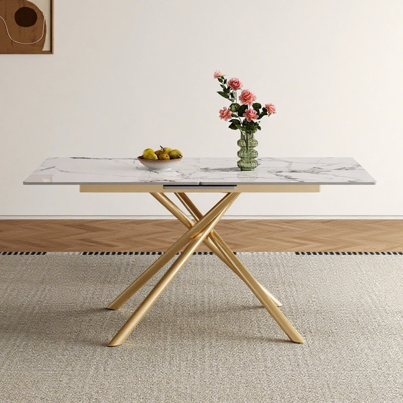 Table de salle à manger extensible Modern Modern avec rallonge rétractable, plateau en pierre frittée et base en X en acier au carbone doré, table robuste pour 4 à 6 personnes