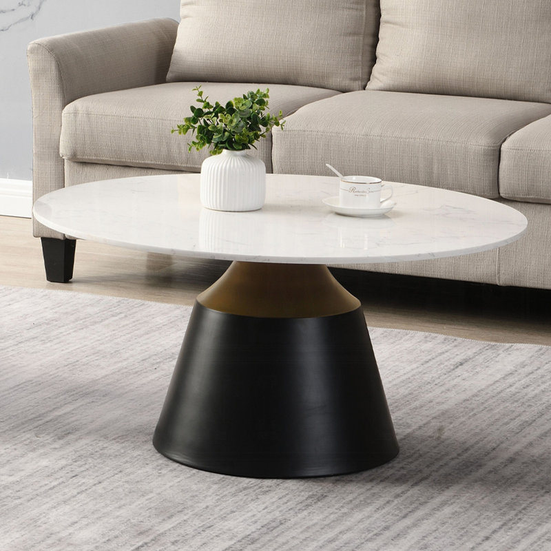 Table basse ronde avec plateau en marbre blanc et noir