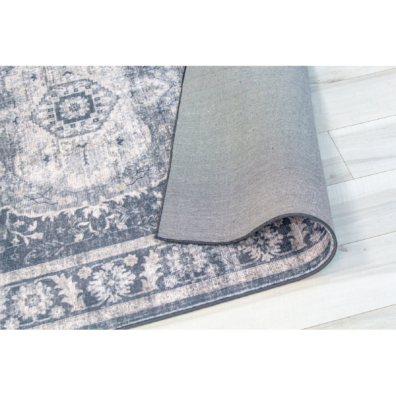 Tapis oriental noir et gris 4 pi x 6 pi