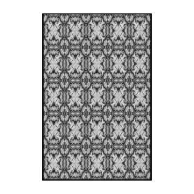 Tapis noir/blanc cassé à motifs