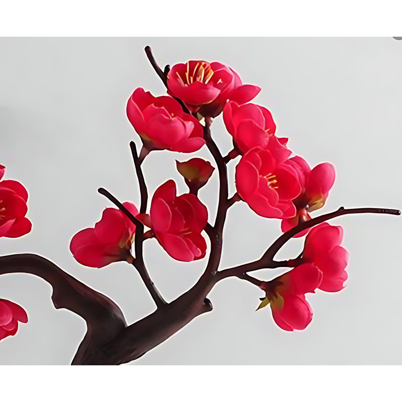 Arrangement de fleurs de prunier