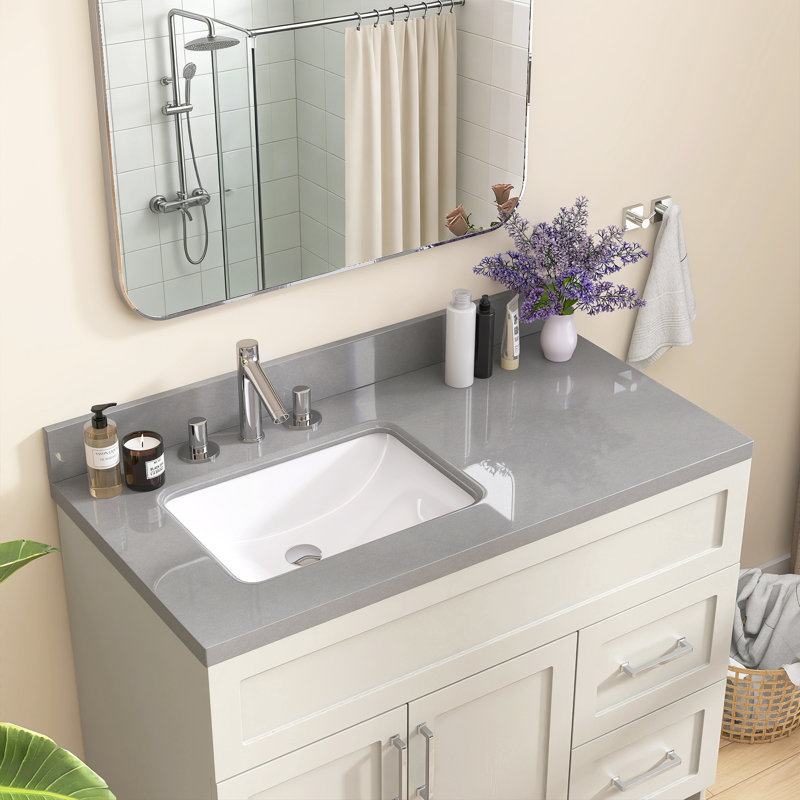 Comptoir de meuble-lavabo en pierre grise l 48 po x P 22 po avec lavabo latéral gauche et configuration de robinet à 3 trous espacés de 8 po