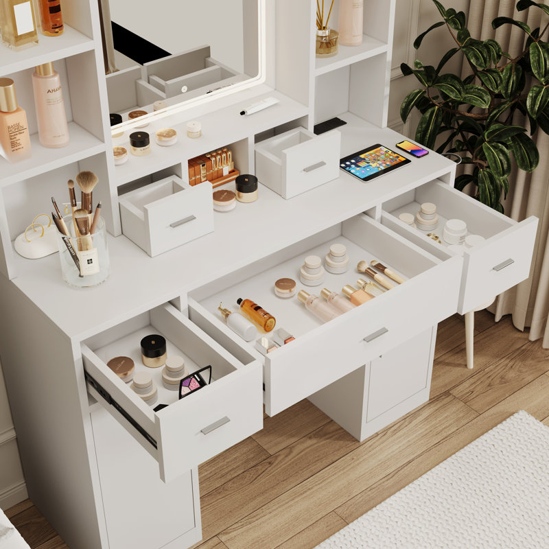The vanity with LED mirror is equipped with a hair dryer rack, and the vanity in the bedroom and dressing room is equipped with a dressing pad