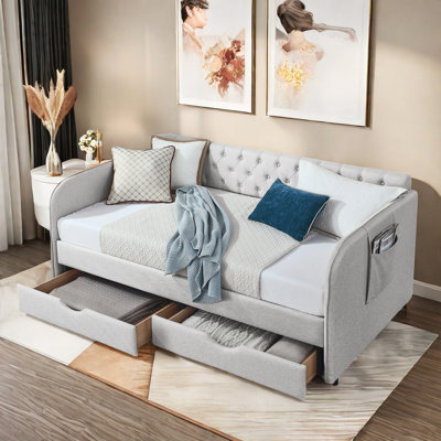 Upholstery Daybed With Trundle, Two Drawers , Side Pockets And Button Tufted Design