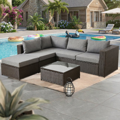 4 - Person Outdoor Wicker Patio Conversation Furniture Set With Coffee Table And Ottoman
