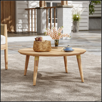 Table basse Verona d'extérieur ronde en bois d'acacia, durable et élégante pour les rassemblements inspirés de la nature