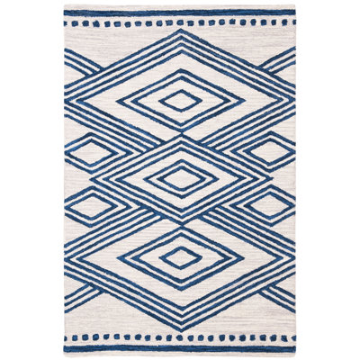 Vedika Hand Tufted Wool Southwestern Rug