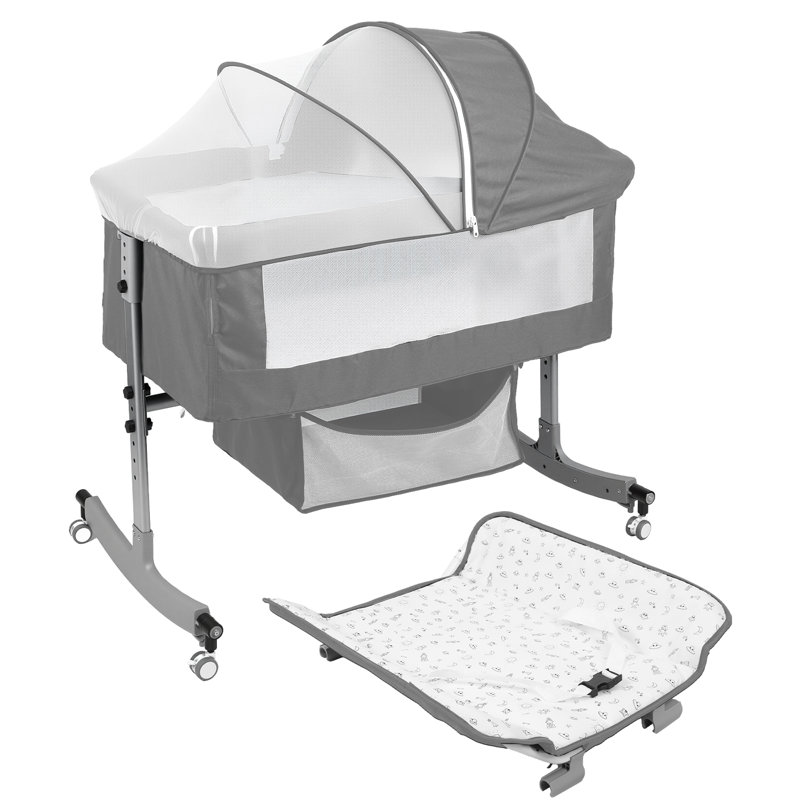 Lit de chevet multifonctionnel 4-en-1 avec table à langer, lit de bébé réglable en hauteur à 6 niveaux avec panier et moustiquaire, berceau portable pour nouveau-né avec roues