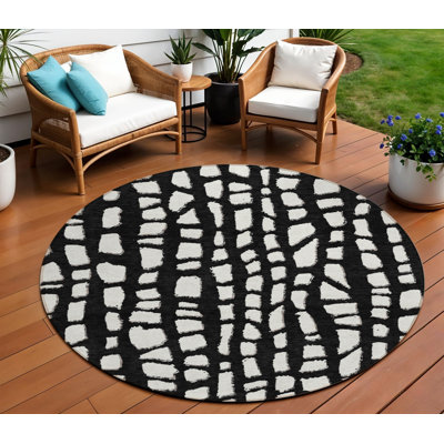 Tapis rond noir et ivoire 8 po