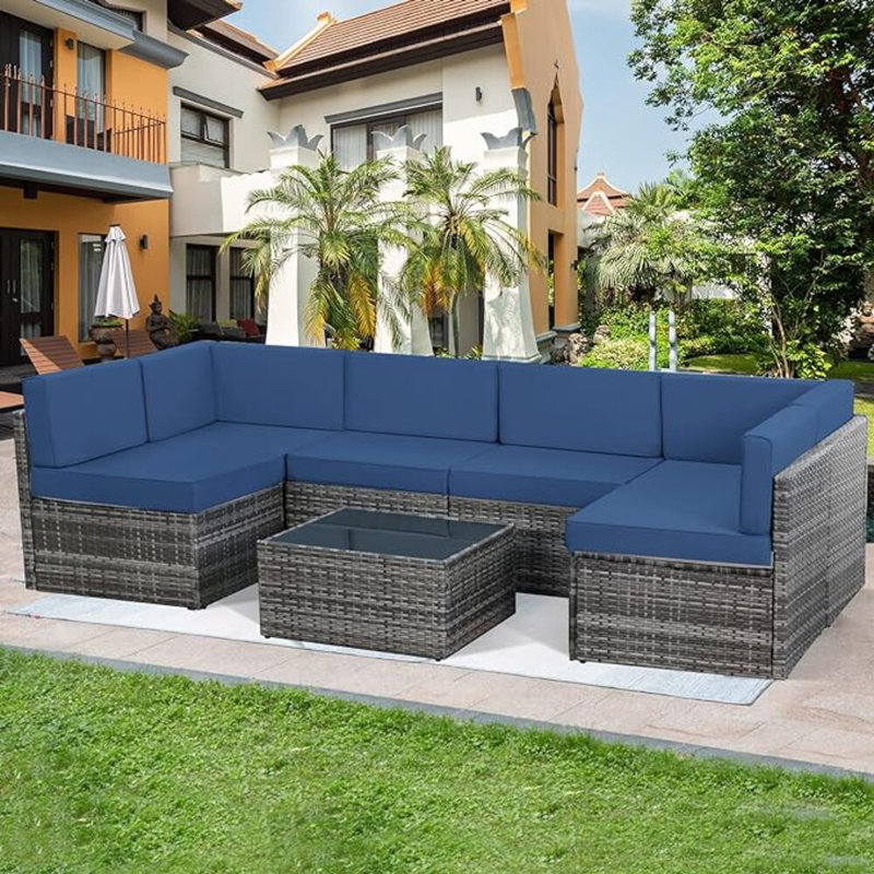 Emilienne 7 Piece Rattan Sectional Seating Group with Cushions, Grey, Navy