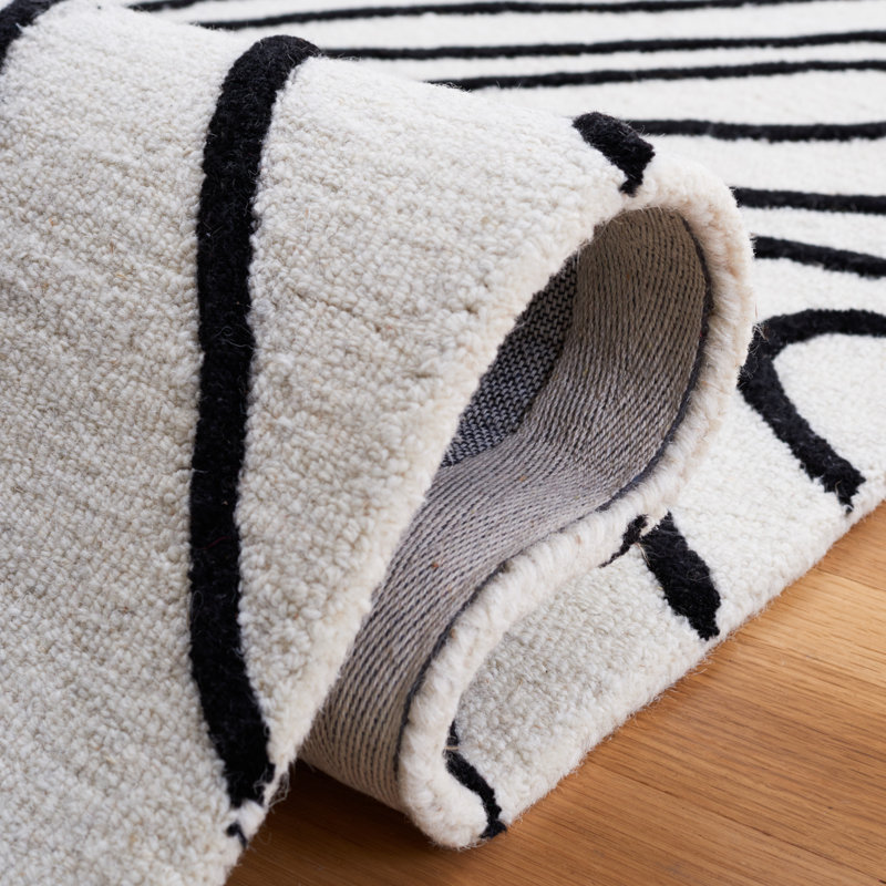 Felipe Handmade Black and Ivory Wool Rectangular Rug