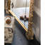 Miroir mural arqué de style antique avec cadre doré