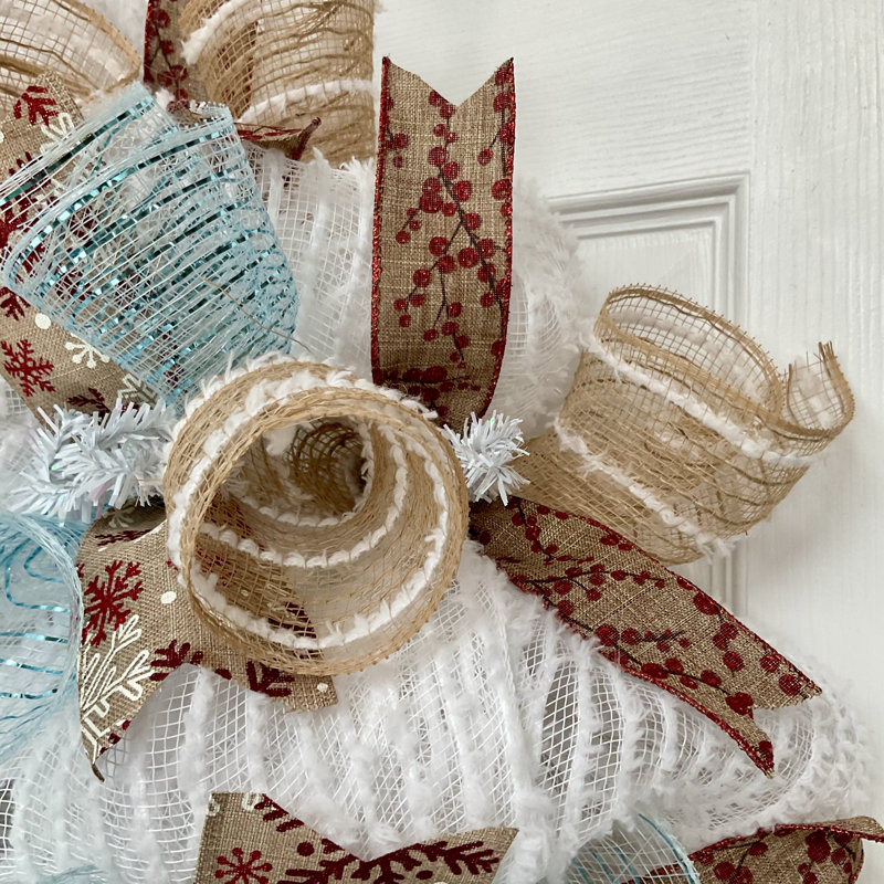 Couronne de Noël avec un chapeau de père Noël