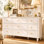 Commode double à 9 tiroirs de 160 cm de large avec poignées dorées, style classique pour chambre à coucher.