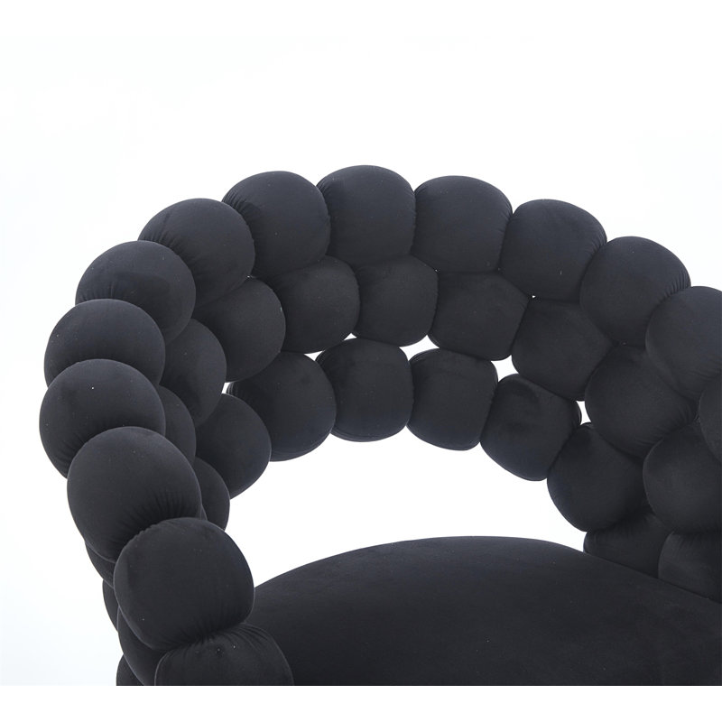 Chaise noire moderne avec pieds en fer de couleur dorée