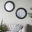 Miroir mural circulaire avec cadre en bois noir
