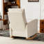 Chaise berçante avec repose-pieds et dossier haut, en bois d'hévéa et rembourrée pour une expérience d'assise confortable.