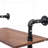 Versatile Industrial Pipe Shelf with Multiple Tiers and Hooks for Various Spaces