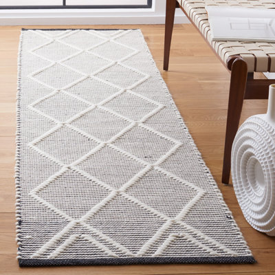 Jacques Hand Woven Wool/Cotton Geometric Rug in Black/Ivory