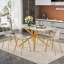 Luxueuse grande table de salle à manger avec plateau en verre marbré et pieds dorés