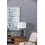 Lampe de table vibrante en verre bleu avec abat-jour en lin