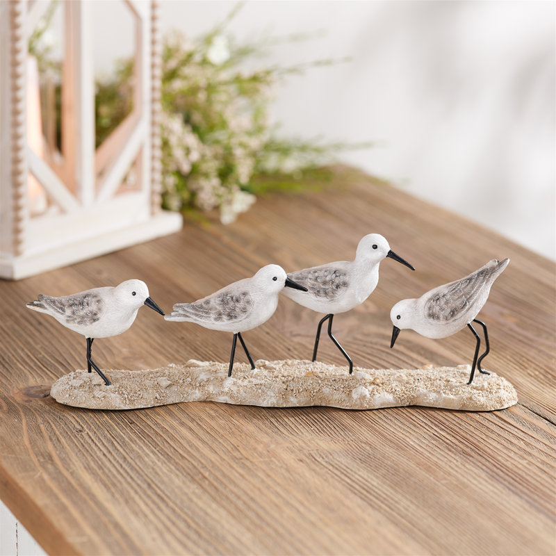 Figurine oiseaux de mer sur une branche