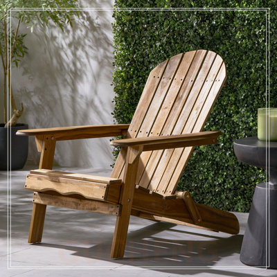 Chaise Adirondack pliante avec dossier à lattes et accoudoirs larges, parfaite pour la terrasse extérieure et le jardin