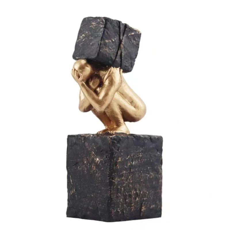 Penseur avec figurine de pierre lourde